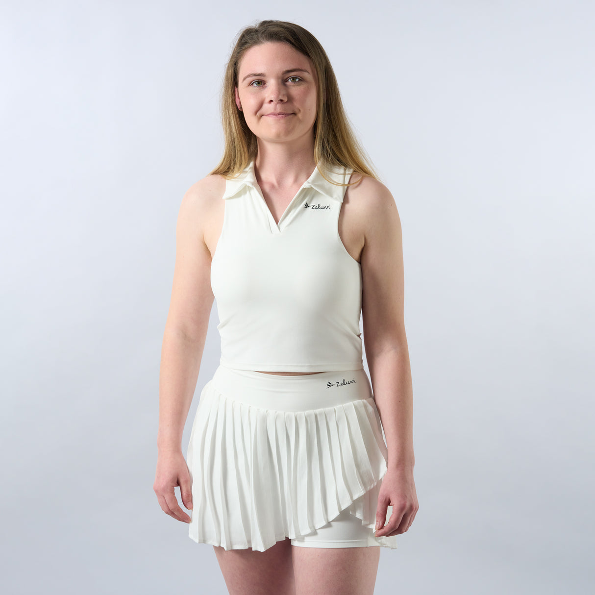 Zeluri Women's Sleeveless Tennis Top and Pleated Skirt Set